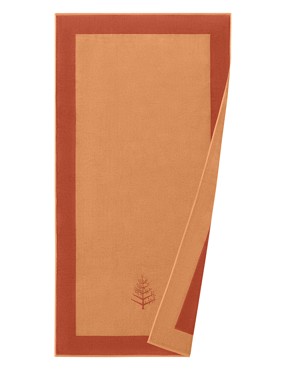 A "Arabian Terracotta" Resort Towel with a subtle embroidered Four Seasons logo. The towel features a darker border and is folded on a white background. - {{Arabian Terracota}}