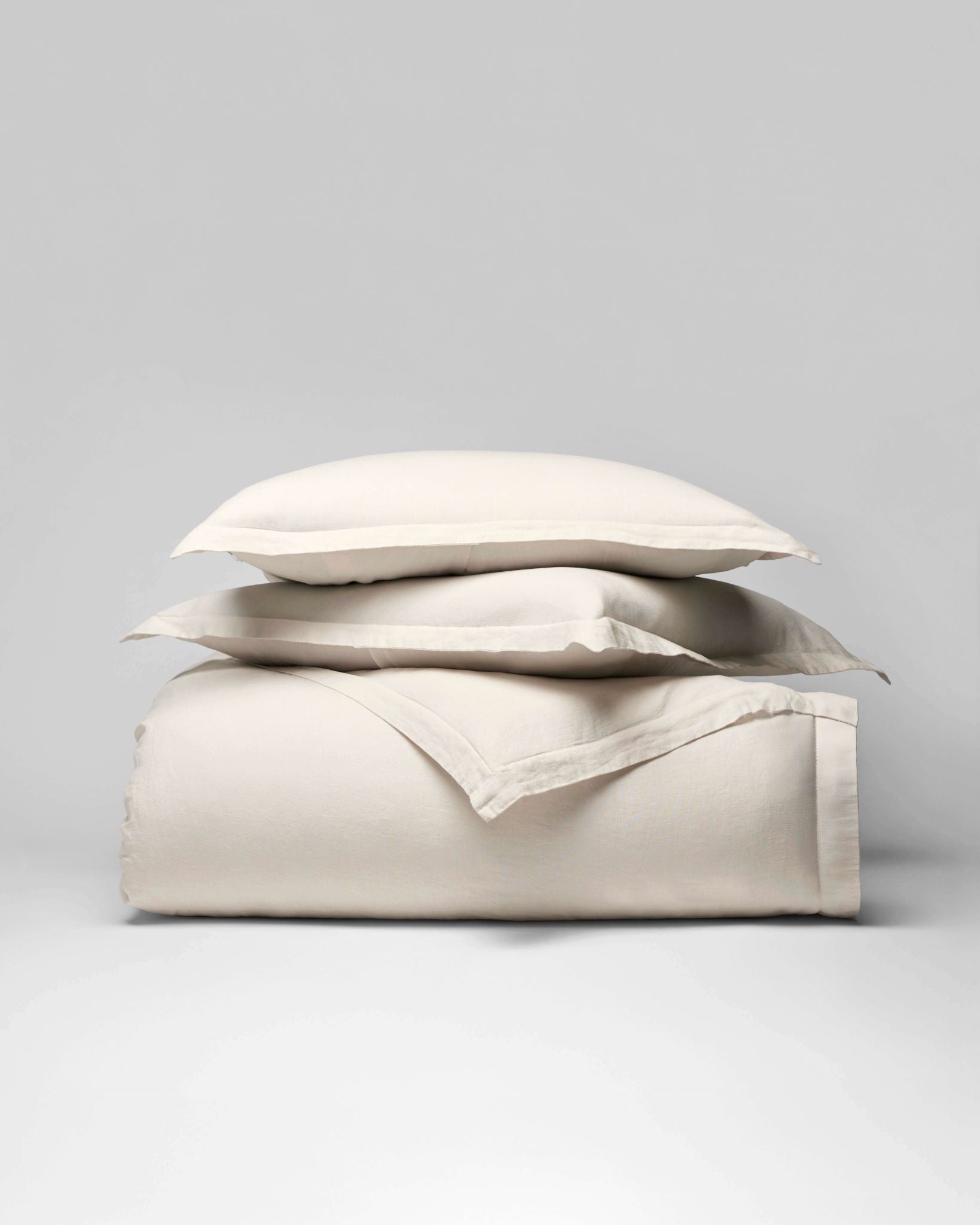 Acacia Duvet Cover Set in Balinese Pearl—stacked linen duvet cover with pillow and Euro shams, soft flange edges - {{Balinese Pearl}}