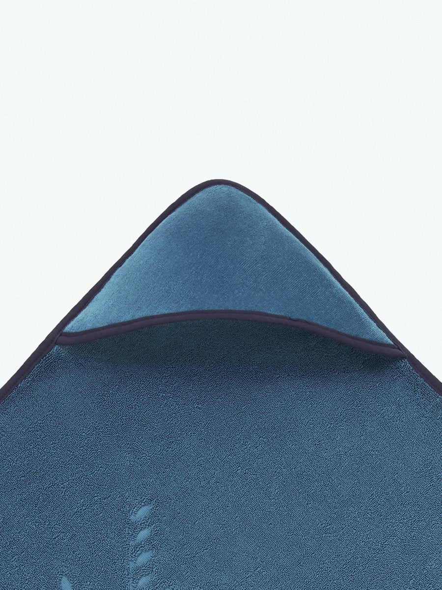 Close-up of the hooded end of a "Underwater Blue" baby towel. - {{Underwater Blue / Mountain Grey}}