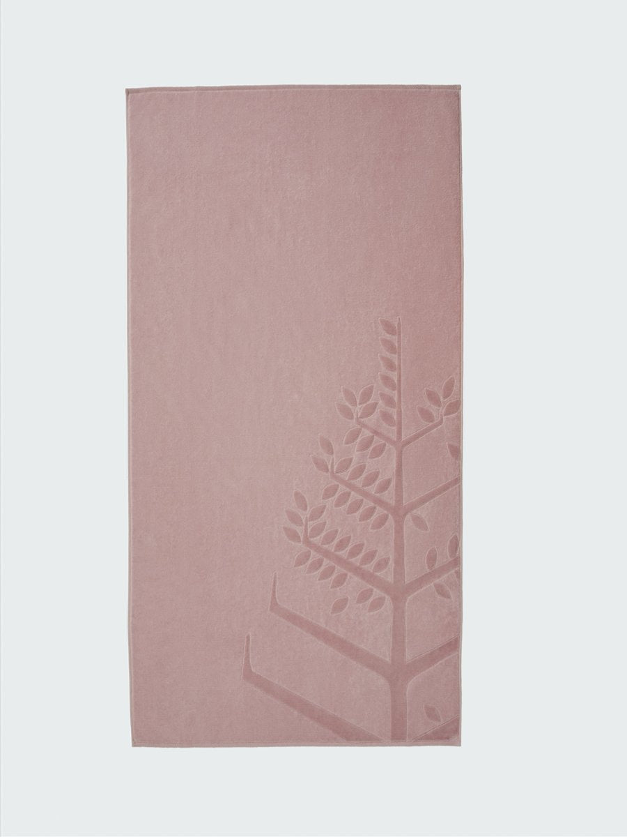 A 'Hawaiian Sunrise' beach towel with the Four Seasons logo embossed on it. - {{Hawaiian Sunrise}}