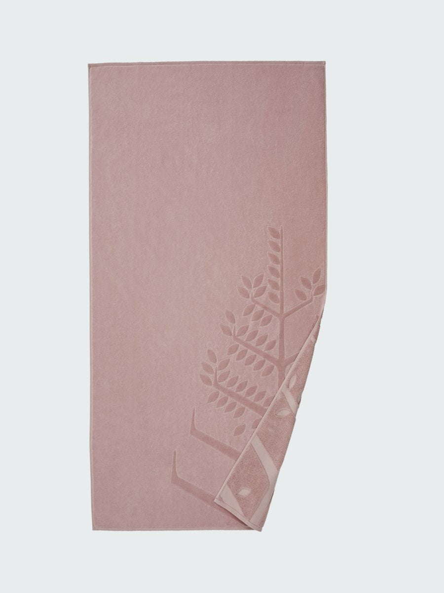 'Hawaiian Sunrise' beach towel with an embossed Four Seasons logo. Part of the towel is folded back to reveal the same design on the bottom. - {{Hawaiian Sunrise}}