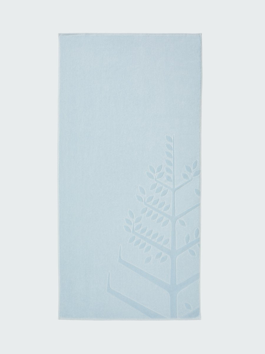 A 'Maldivian Atoll' beach towel with the Four Seasons logo embossed on it." - {{Maldivian Atoll}}
