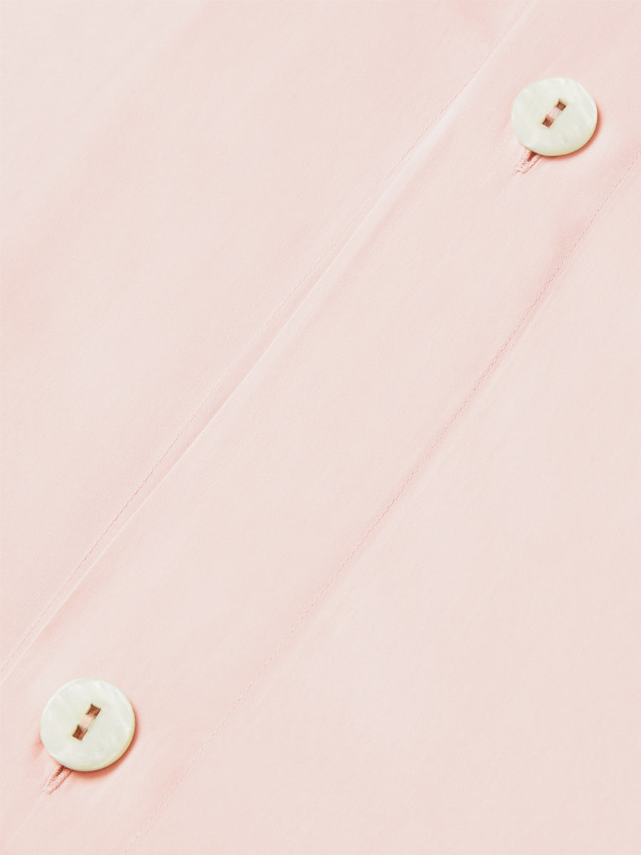 Close-up of hidden button closure on the Kyoto Blush duvet cover. {{Kyoto Blush}}