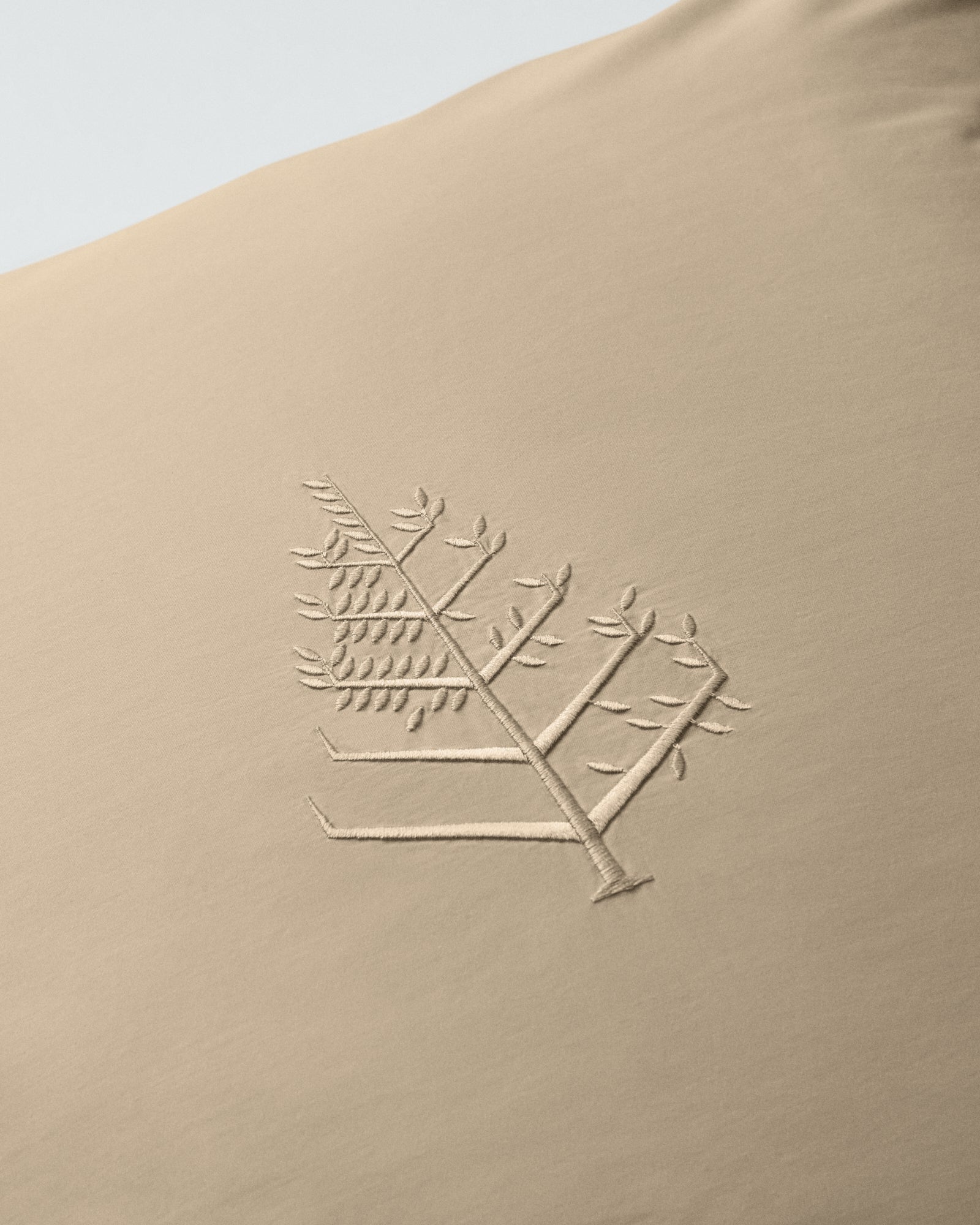 Close-up of Egyptian Camel Euro sham with tone-on-tone logo store embroidery. {{Egyptian Camel}}