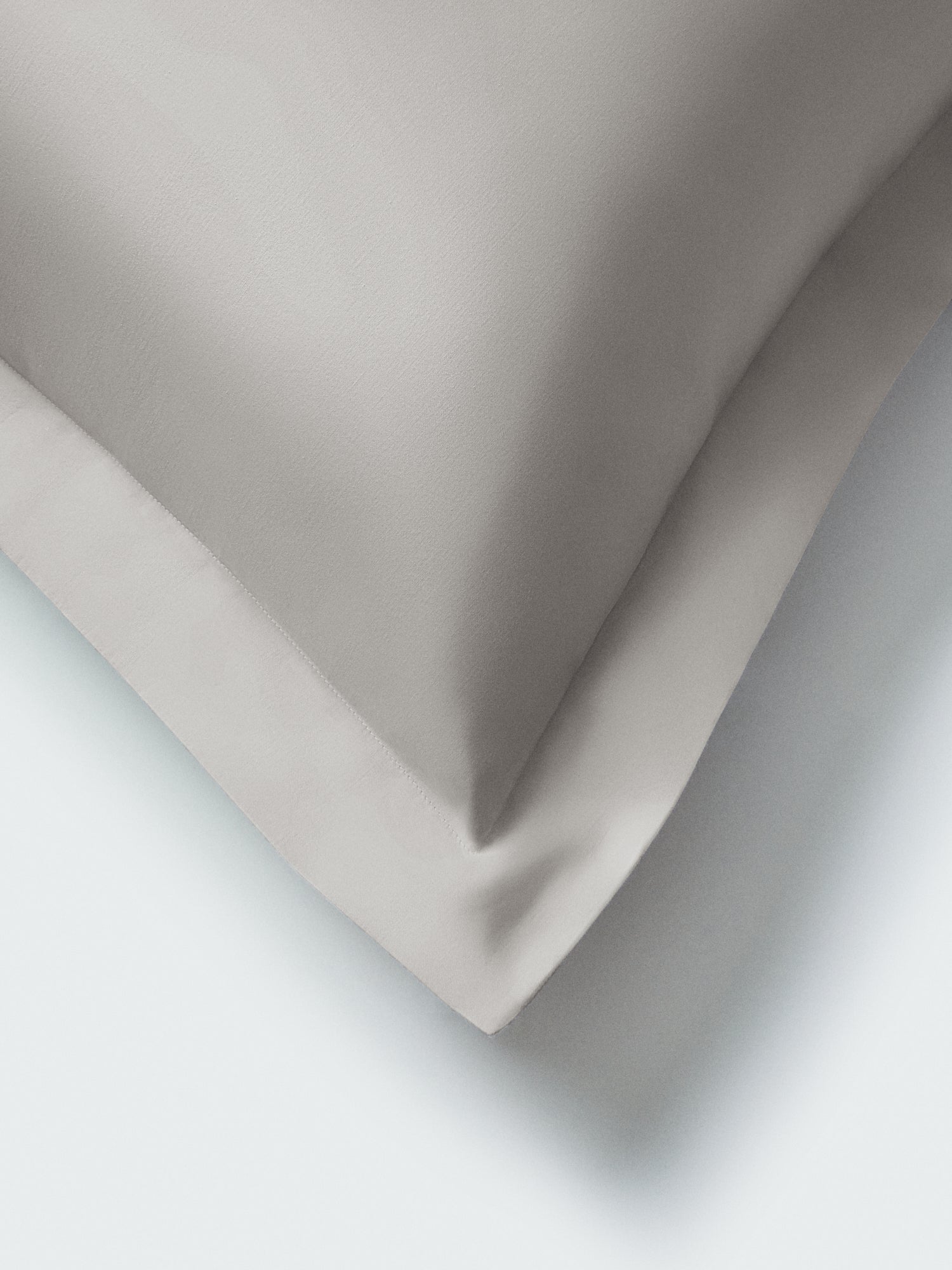 Close-up of a Spanish Slate Euro sham corner with a flange border. {{Spanish Slate}}