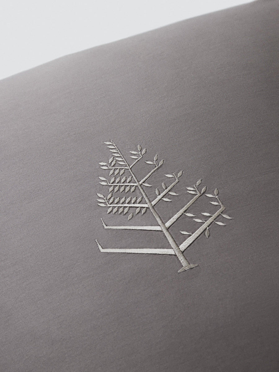 Close-up of Hampshire Charcoal Euro sham with tone-on-tone logo store embroidery. {{Hampshire Charcoal}}