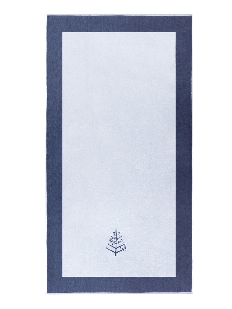 A "Maldivian Atoll" Resort Towel with a subtle embroidered Four Seasons logo. The towel features a darker border - {{Maldivian Atoll}}