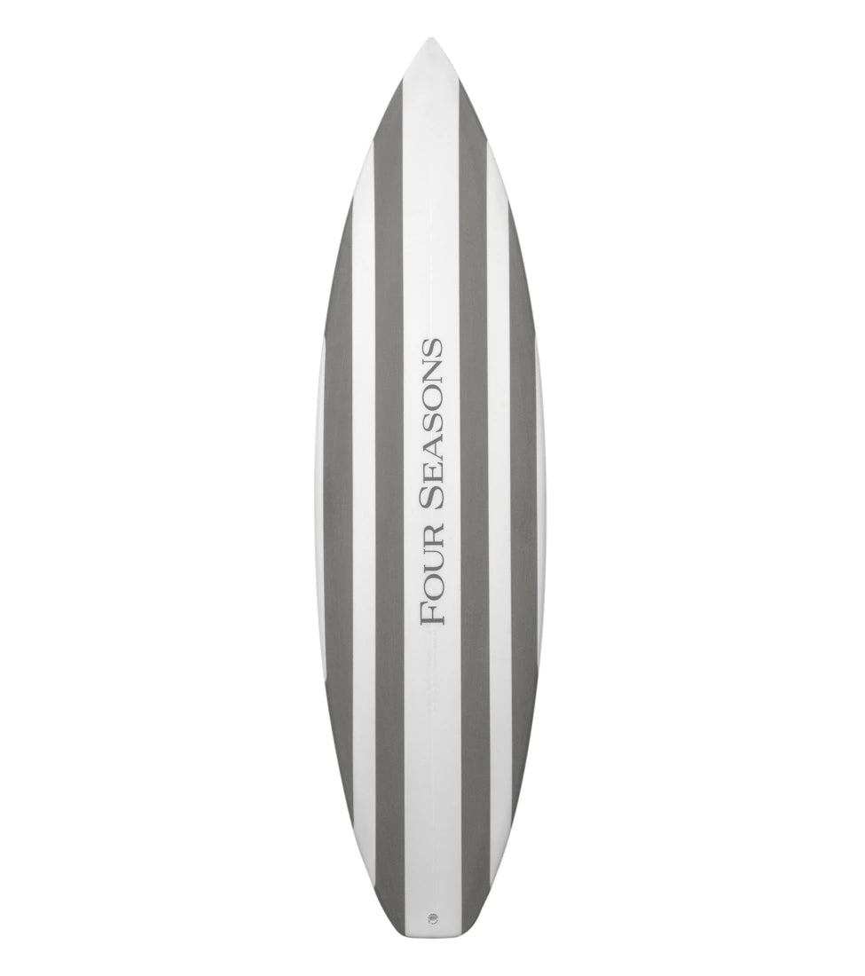Surfboard with 'Four Seasons' branding on a white background - {{Hampshire Charcoal}}