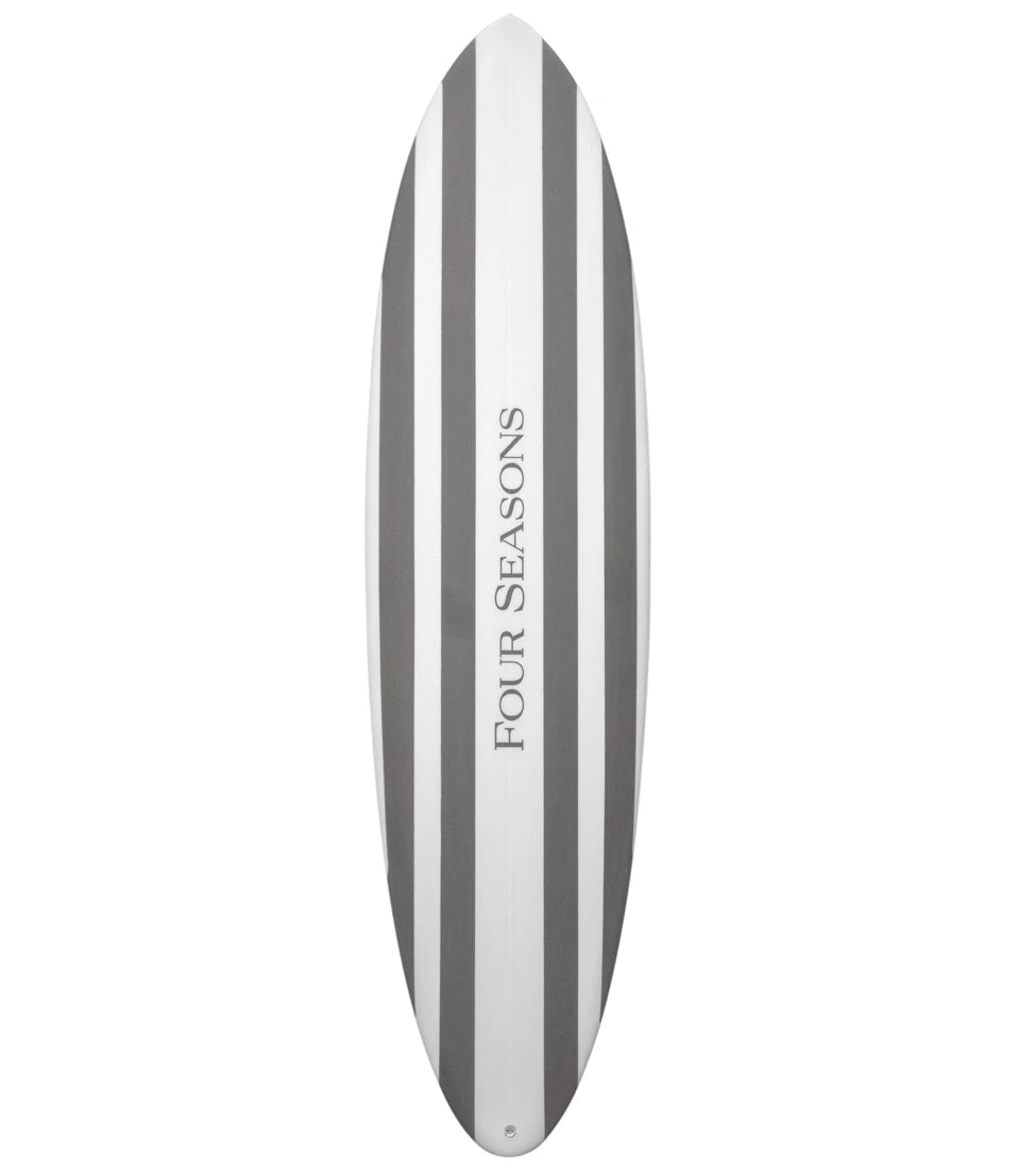 Surfboard with 'Four Seasons' branding on a white background - {{Hampshire Charcoal}}