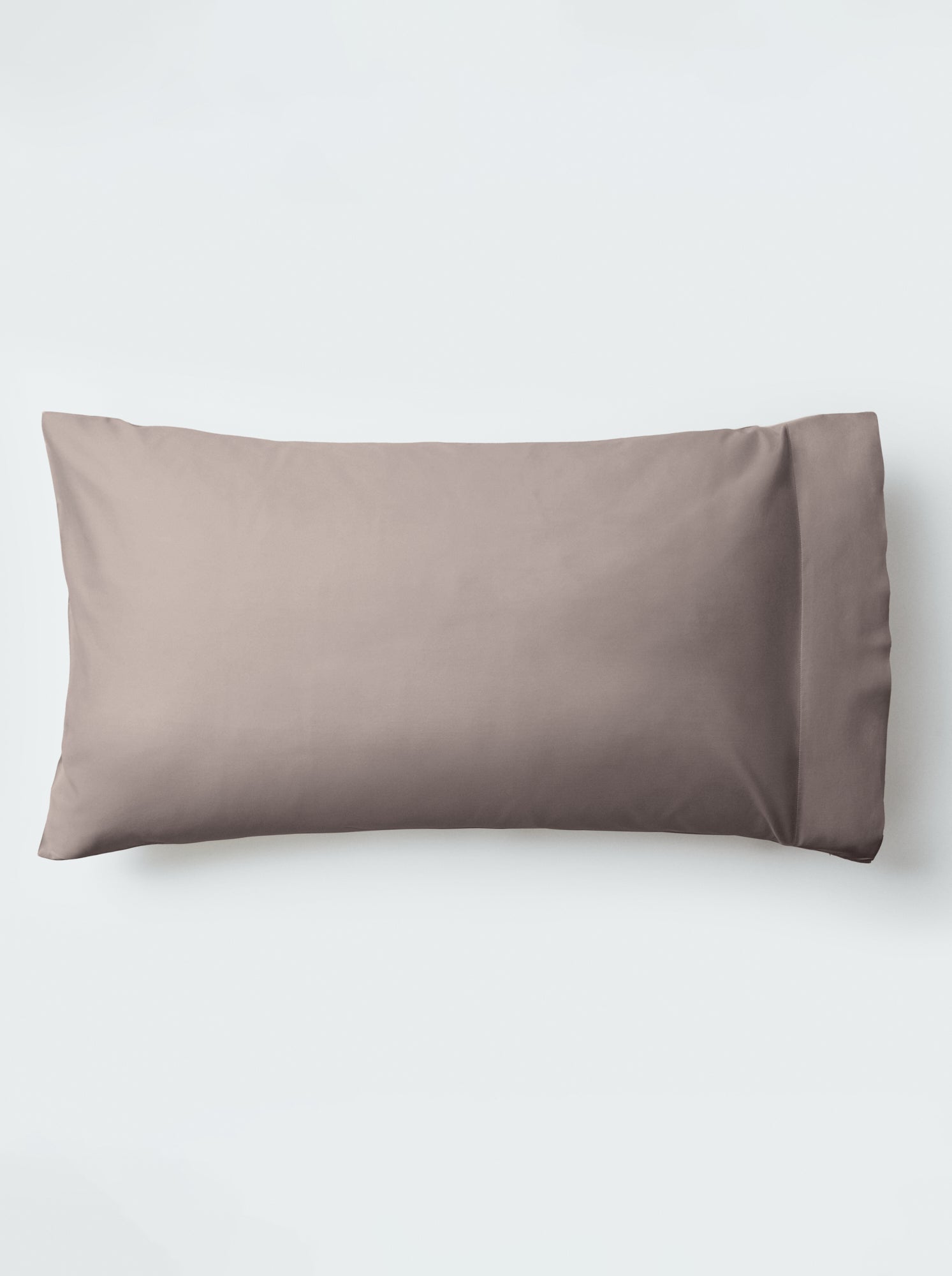 A pillow with an elegant Moroccan Sand color pillowcase. - {{Moroccan Sand}}