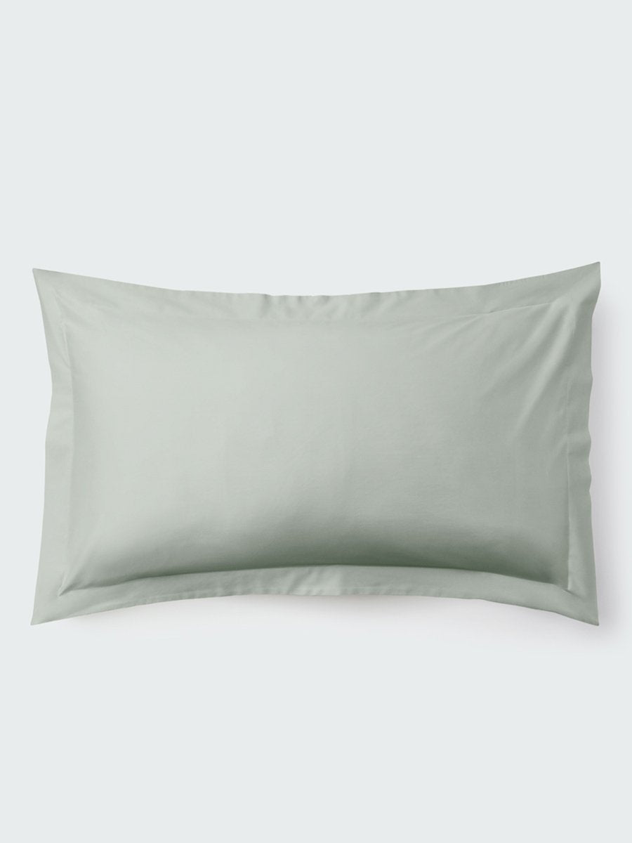 A rectangular pillow with a Florentine Sage color pillowcase, featuring a delicate embroidery that runs along the entire edge. - {{Florentine Sage}}
