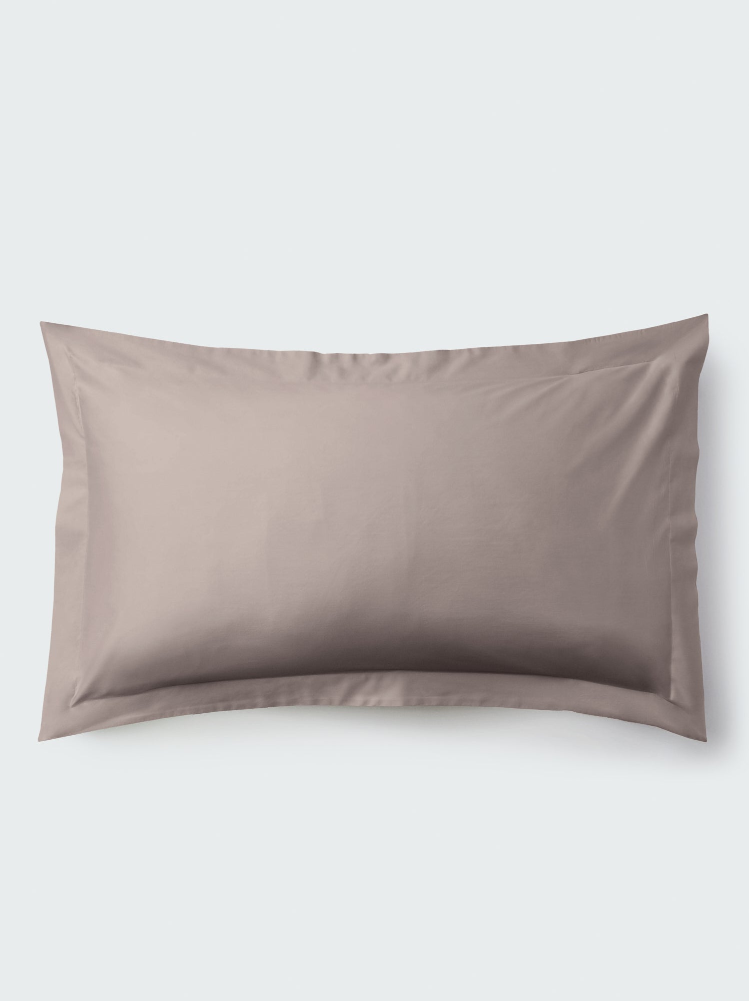 Front view of pillow sham in Moroccan Sand with tailored flange on a light background. {{Moroccan Sand}}