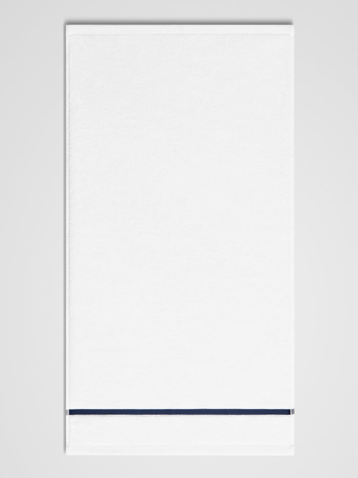 Sycamore Bath Towel, with navy piping detail. {{Signature White}}