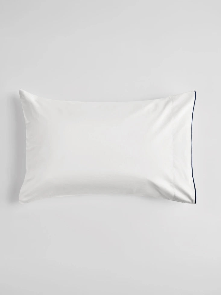 Close-up of Sycamore Sheet Set pillowcase in Signature White, {{Signature White}}