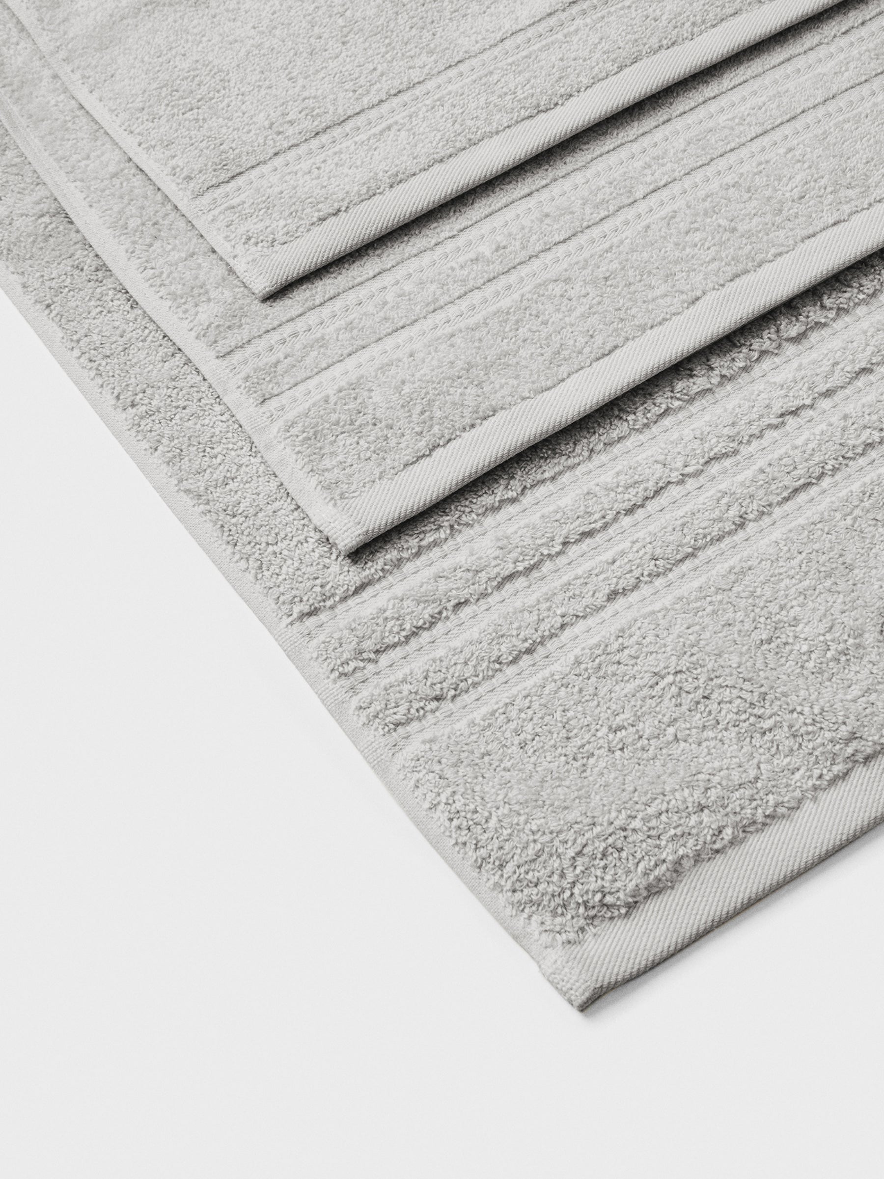 towel set in Turkish Silver, finished with a patterned dobby border. - {{Turkish Silver}}