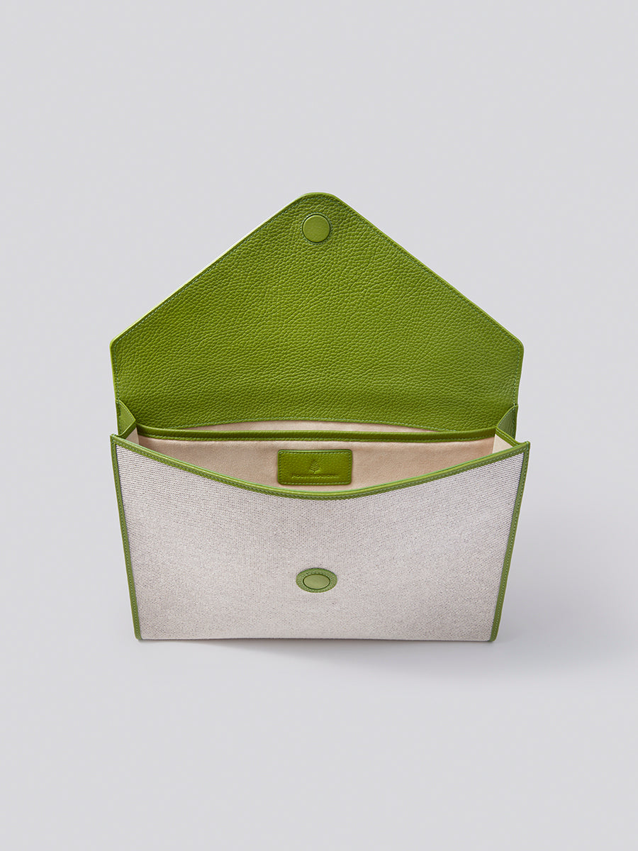 The Laptop Sleeve in Kyoto Matcha from the Four Seasons Travel Collection with the interior visible. - {{Kyoto Matcha}}