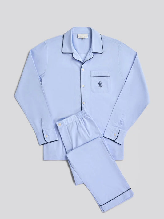 Light blue pajama set with a Four Seasons Logo embroidered design on the front pocket and navy piping on hem.