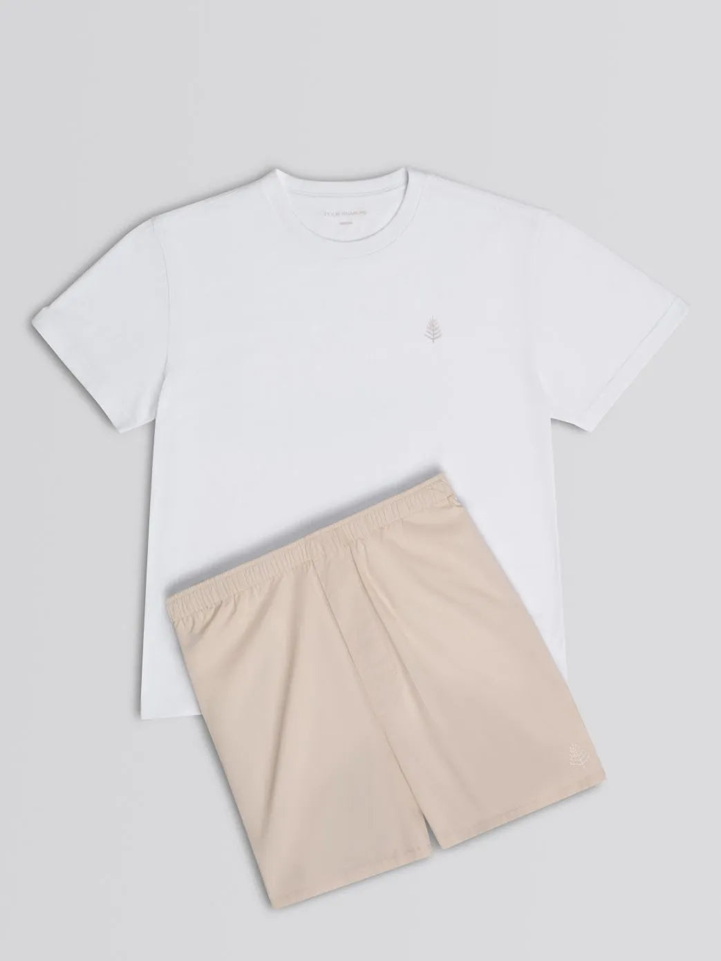 White t-shirt and balinese pearl pajama shorts on a light gray background {{Balinese Pearl}}