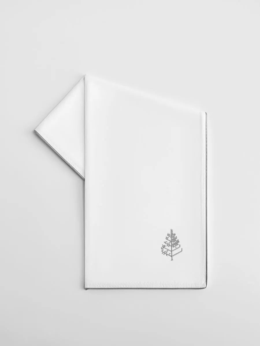 White pillow protector with a Four Seasons Logo on a light gray background