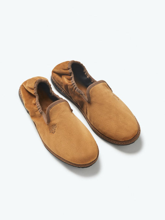 Close-up of the Four Seasons Velvet Slippers in Egyptian Camel, showcasing the luxurious velvet fabric and artisanal hand-stitching. - {{Egyptian Camel}}
