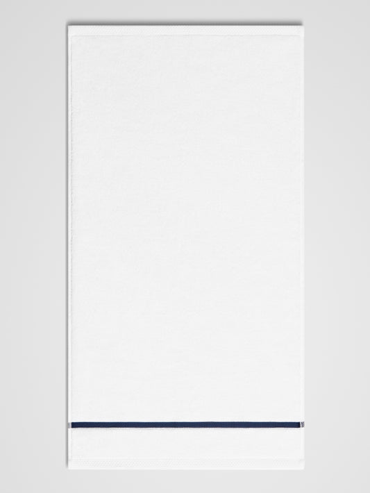 Sycamore Bath Towel, with navy piping detail. {{Signature White}}