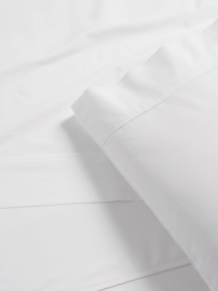 Pillowcase with subtle piping detail. - {{Turkish Silver/Signature White}}