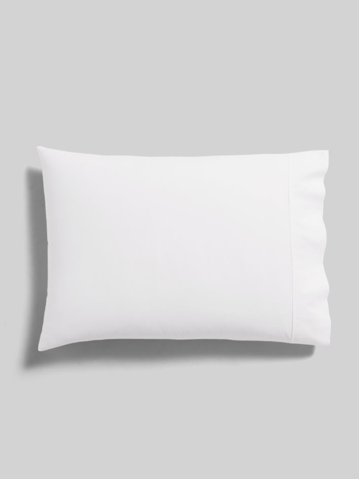A pillow with a soft and elegant finish. - {{Turkish Silver/Signature White}}