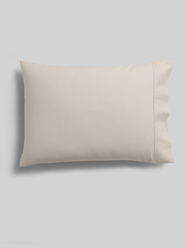 A pillow with a soft and elegant finish. - {{Signature White/Balinese Pearl}}