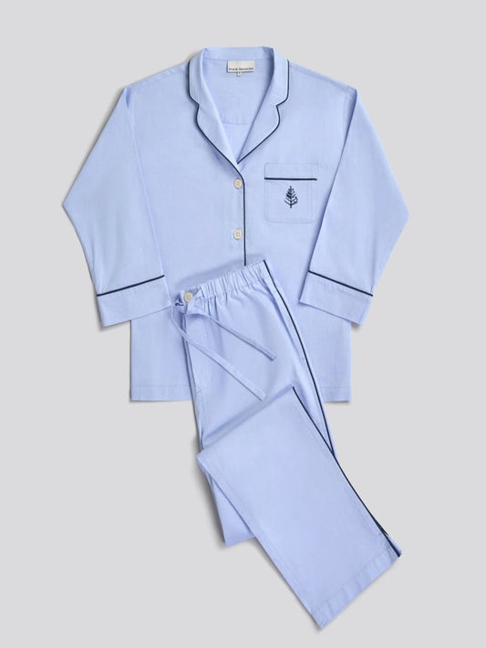 Light blue pajama set with a Four Seasons Logo embroidered design on the front pocket and navy piping on hem.