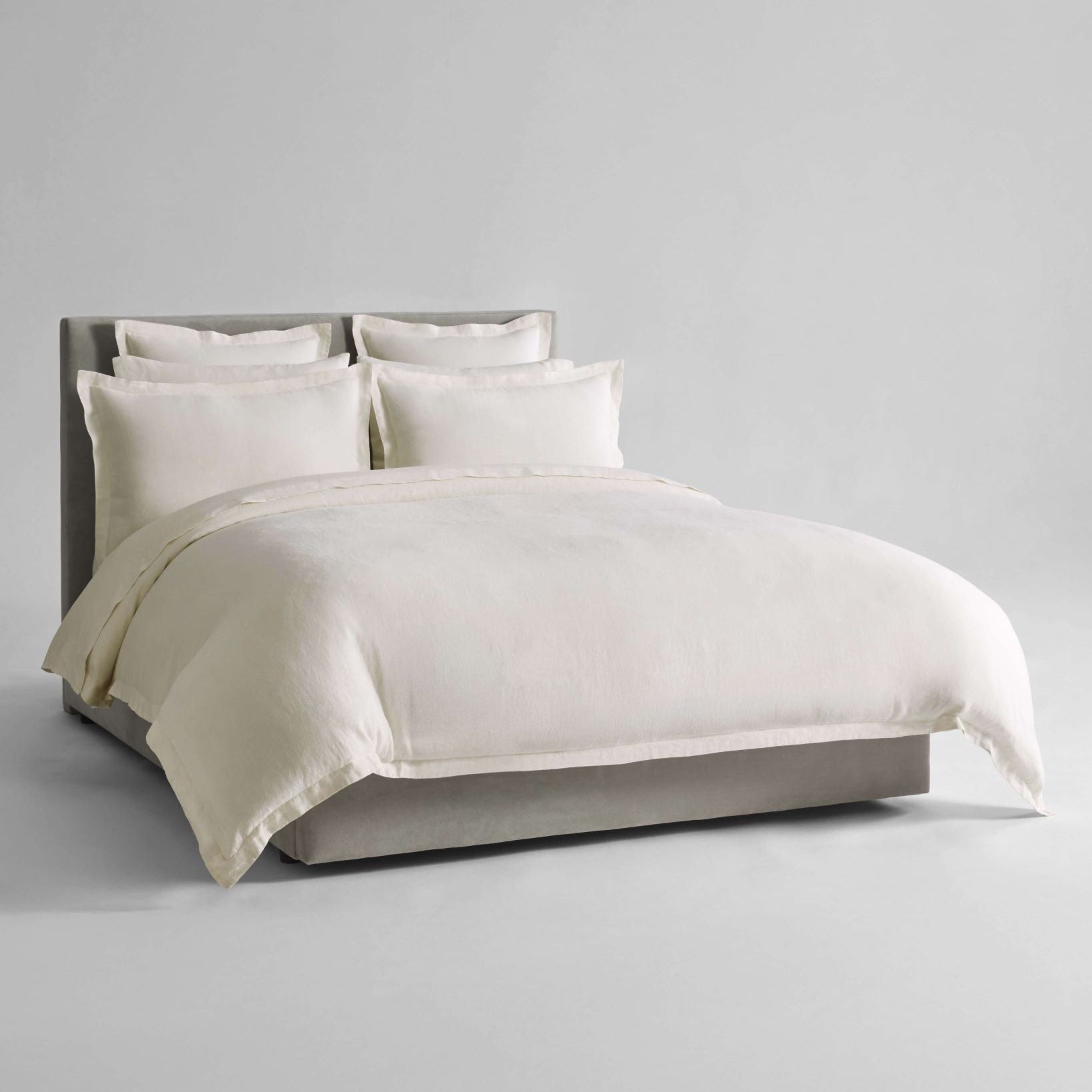 Acacia Dream Set in Balinese Pear—linen duvet with layered Euro and standard shams, front view on a neutral bed - {{Balinese Pearl}}