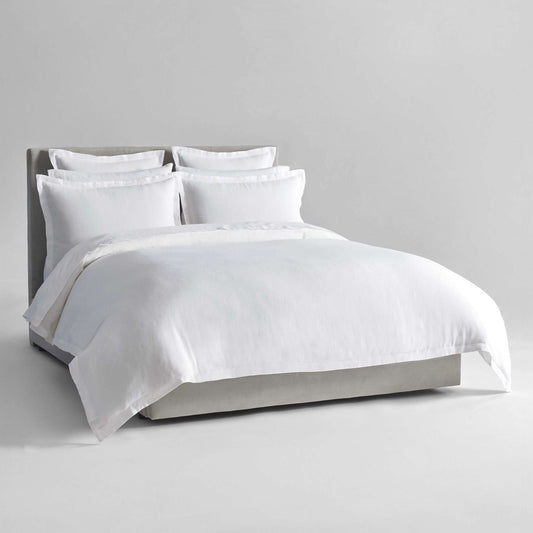 Acacia Dream Set in Signature White—linen duvet with layered Euro and standard shams, front view on a neutral bed - {{Signature White}}