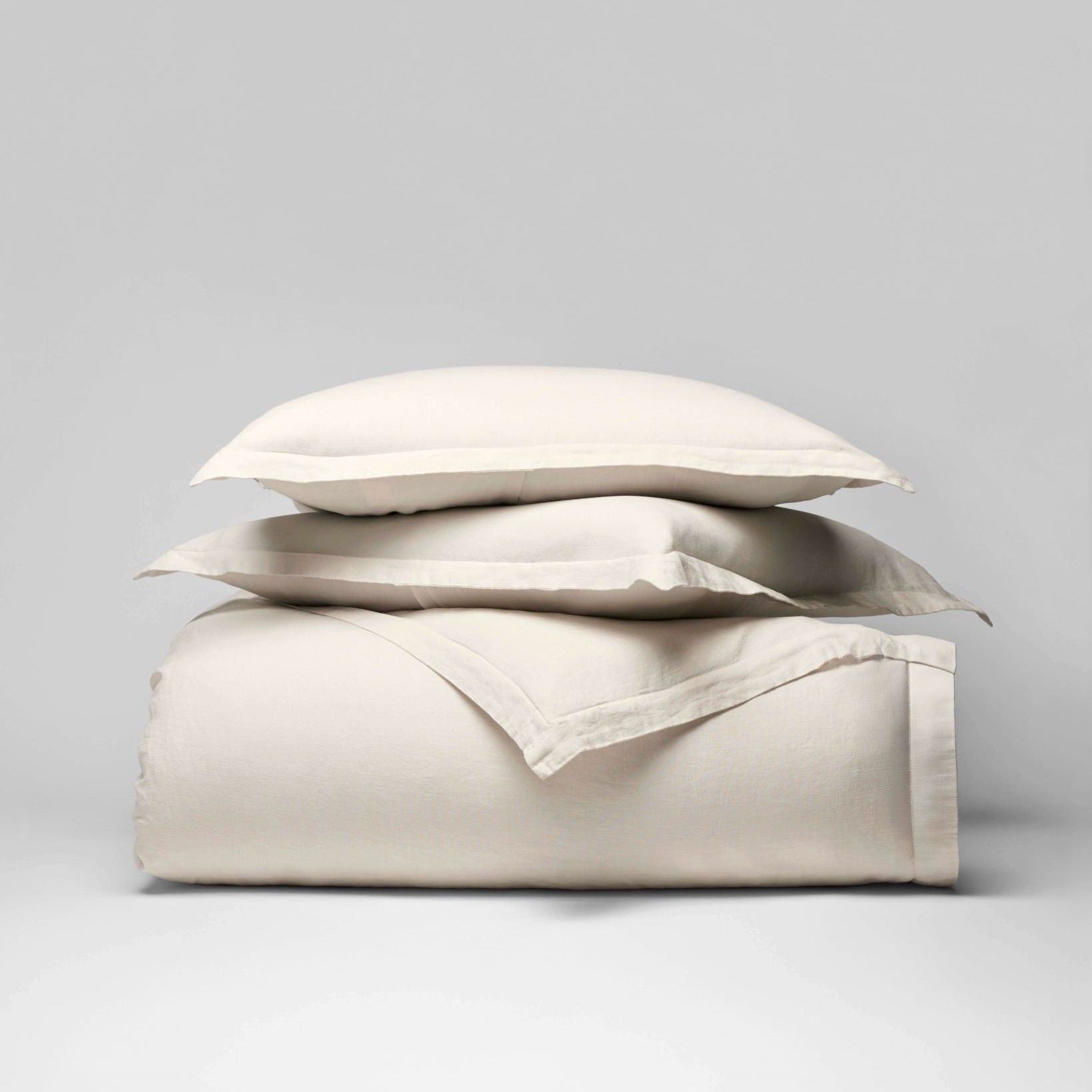 Acacia Duvet Cover Set in Balinese Pearl—stacked linen duvet cover with pillow and Euro shams, soft flange edges - {{Balinese Pearl}}