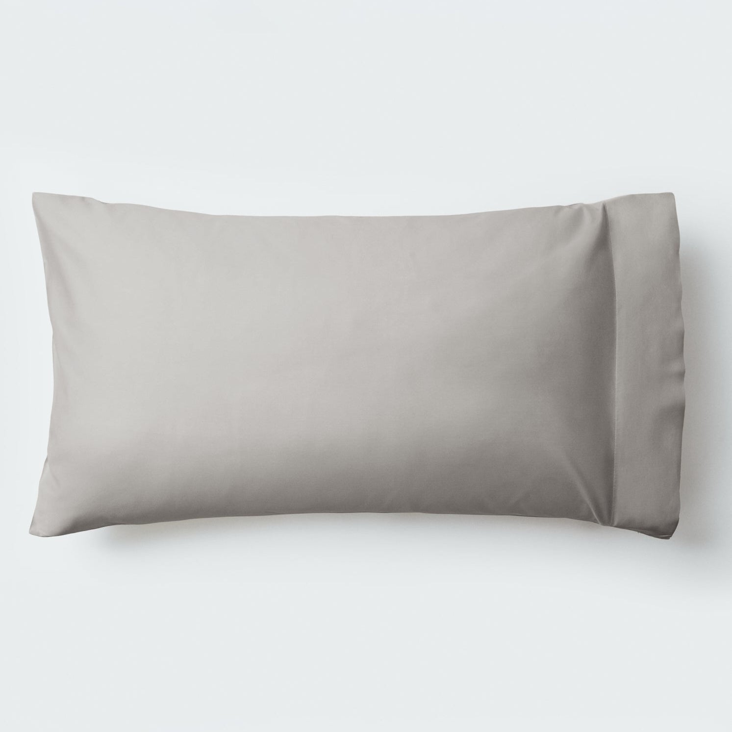 A pillow with an elegant Spanish Slate color pillowcase. - {{Spanish Slate}}