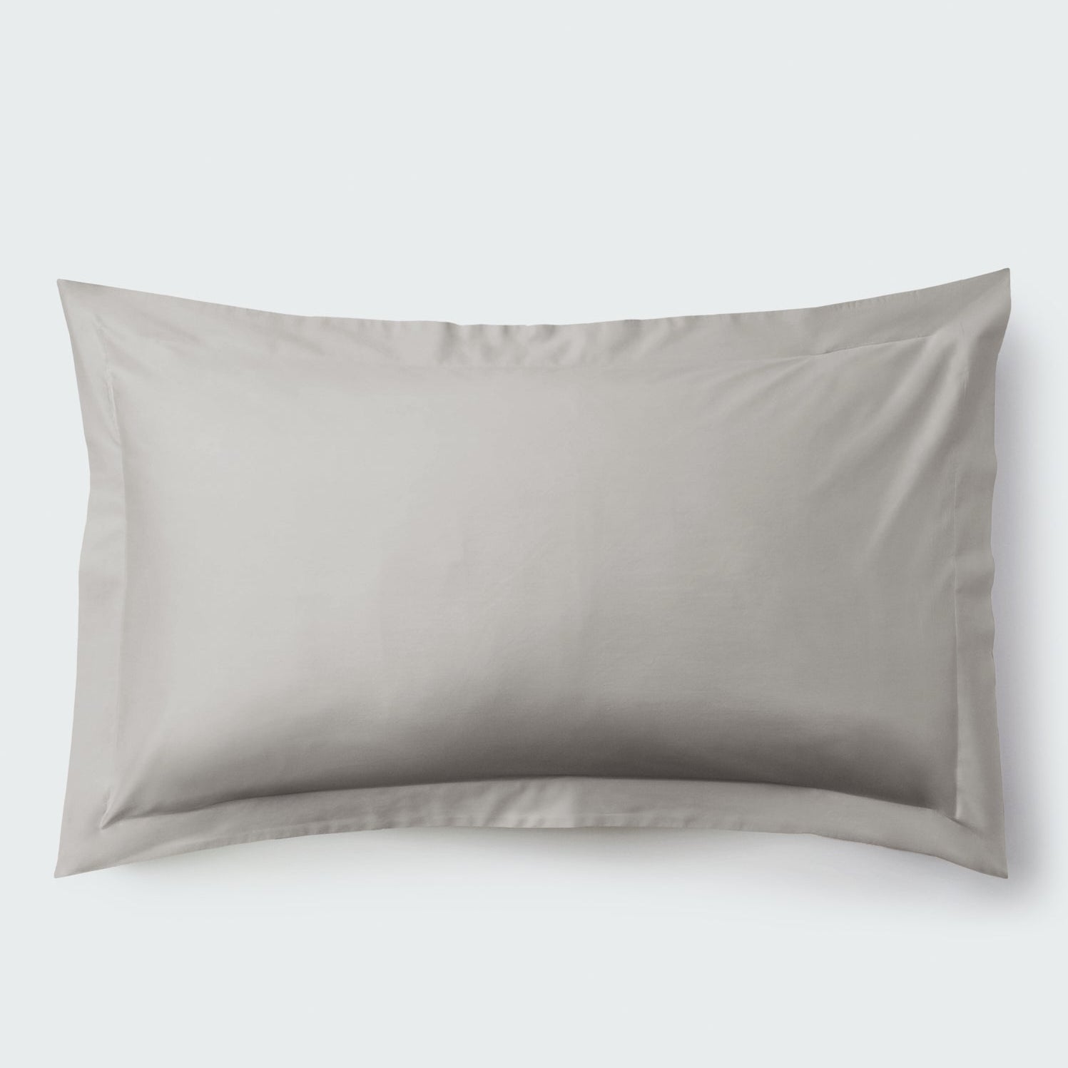 A rectangular pillow with a Spanish Slate color pillowcase, featuring a delicate embroidery that runs along the entire edge. - {{Spanish Slate}}