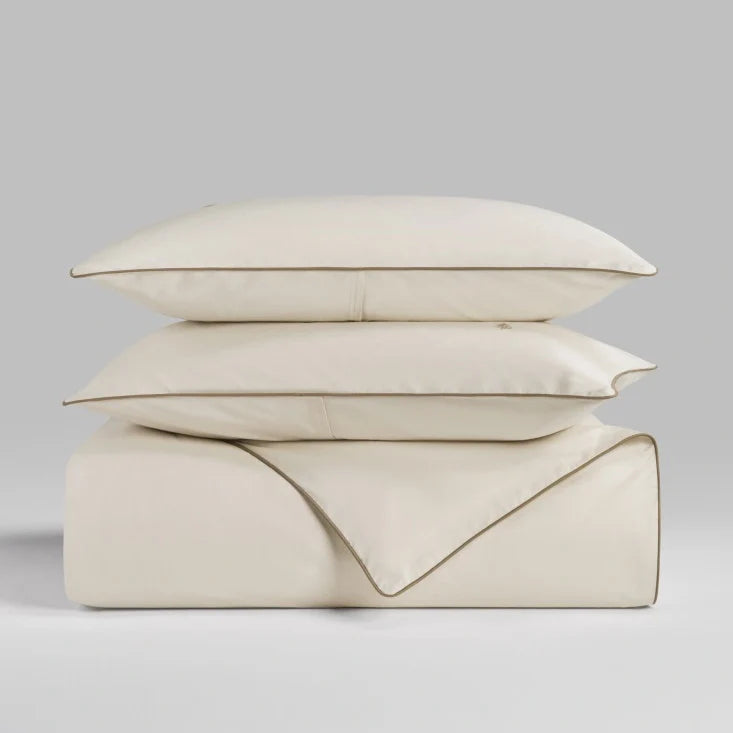 Sycamore Balinese Pearl duvet cover set stacked folded duvet and pillowcases. {{Balinese Pearl}}