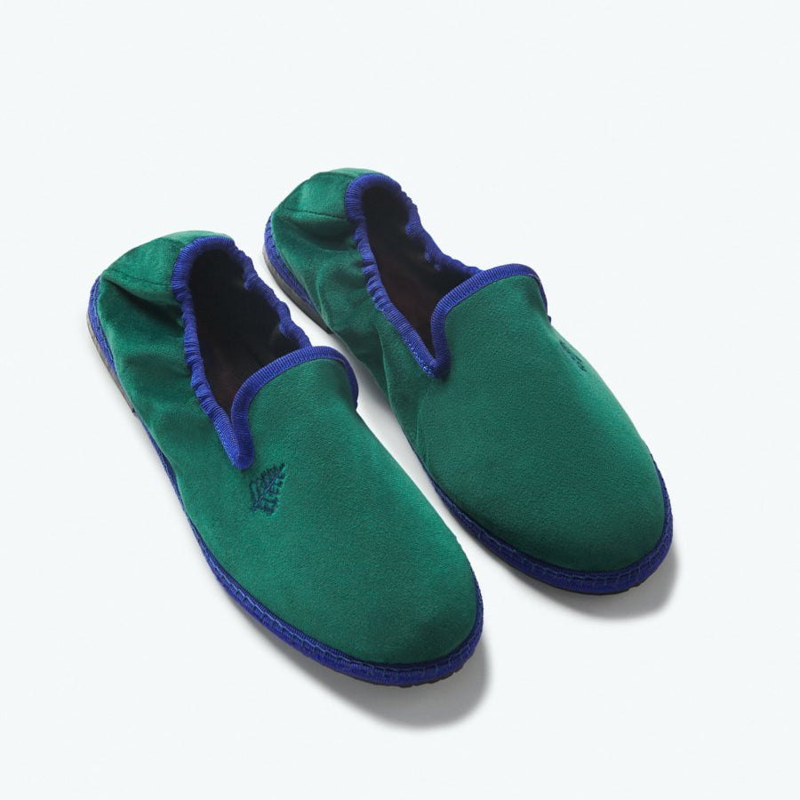 Close-up of the Four Seasons Velvet Slippers in Anguilla Green, showcasing the luxurious velvet fabric and artisanal hand-stitching. - {{Anguilla Green}}
