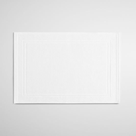 Four Seasons Woven Bath Mat, intricate Swiss dot design, low profile, perfect for bath rituals {{White}}
