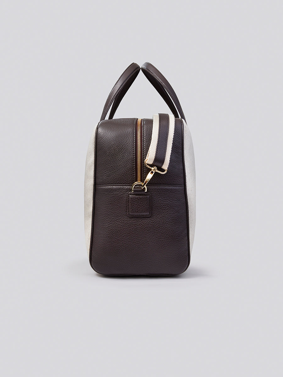 Side view of The Bowler travel bag in Malaysian Cocoa from the Four Seasons Travel Collection.