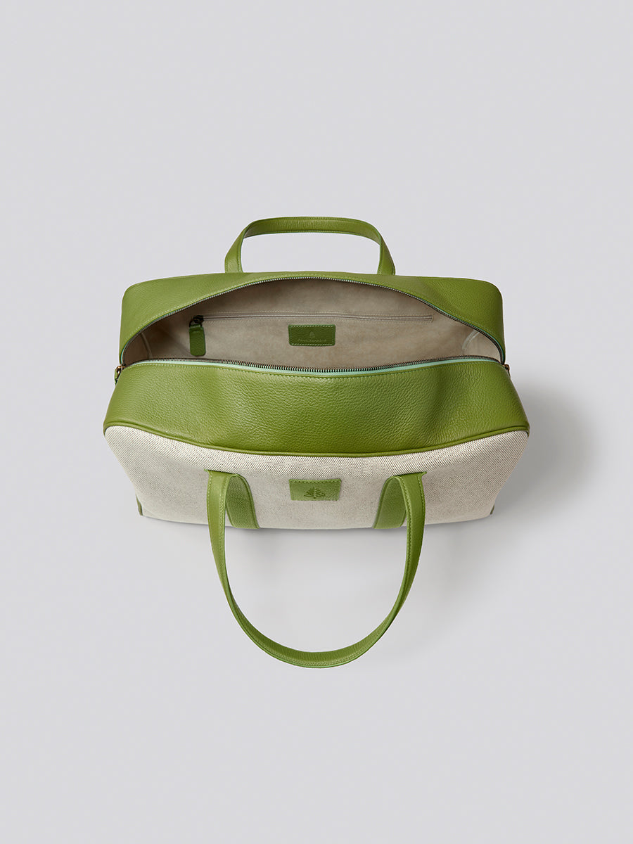 Top view of The Bowler travel bag in Kyoto Matcha from the Four Seasons Travel Collection with the lid open.