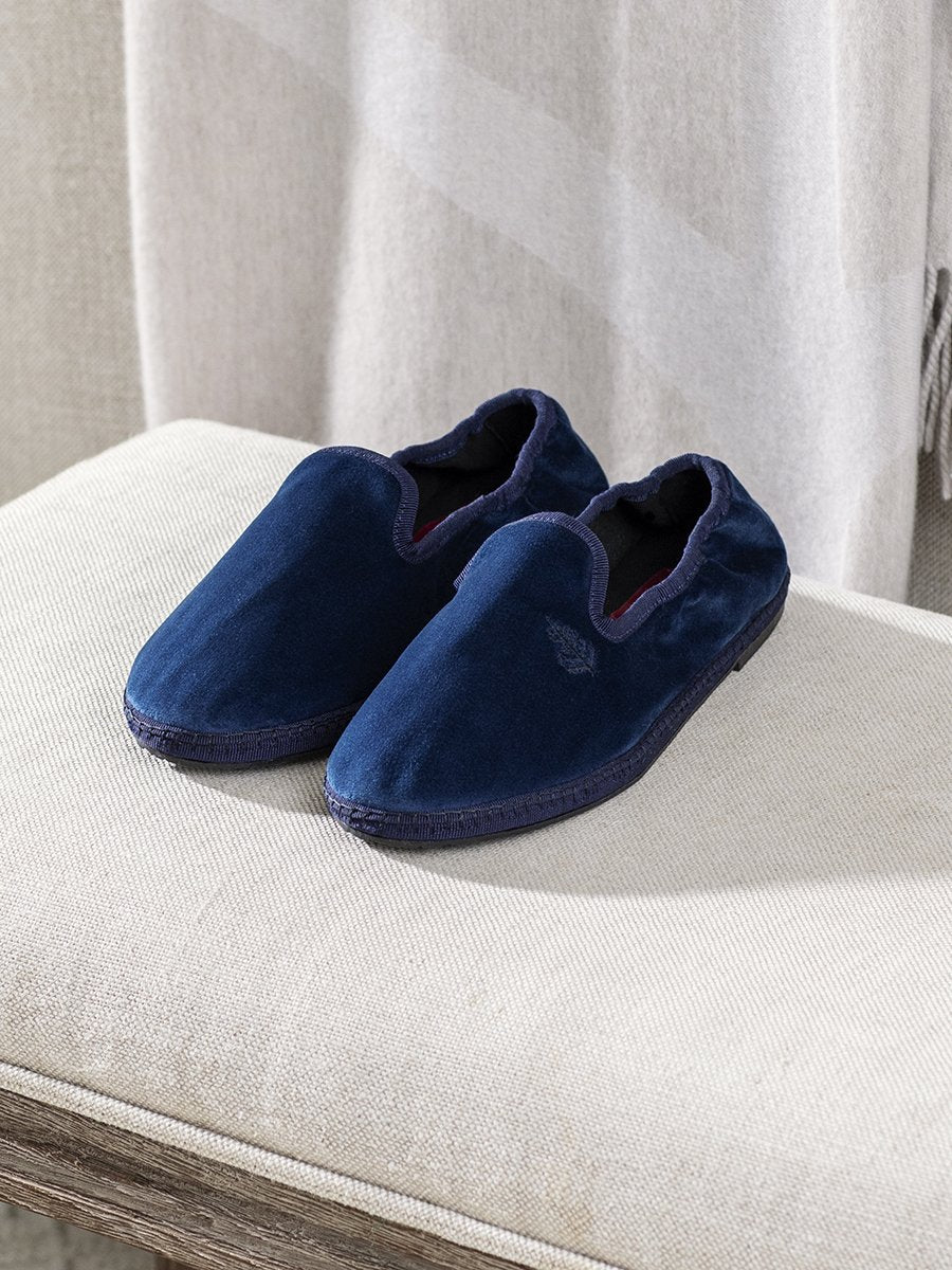 Hand-stitched Velvet Slippers in Riviera Navy with a sustainable rubber sole, offering a combination of style and comfort.